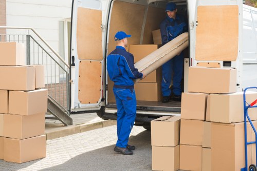 Movers working in a Richmond upon Thames residential street