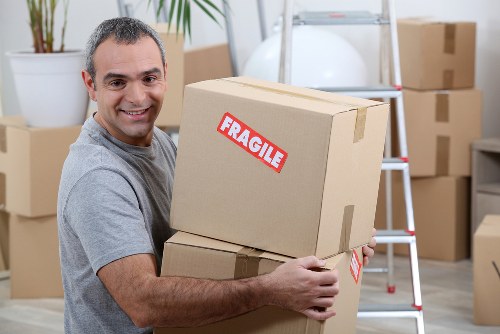Packed moving boxes and furniture for a home removal in Richmond upon Thames