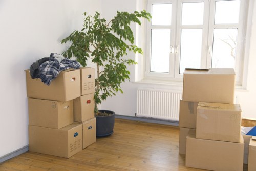 Packing and loading items into a moving van in Richmond upon Thames