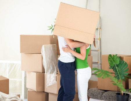 Careful loading of boxes and household items into a van