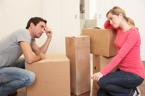 Local movers handling furniture in a Richmond residential street