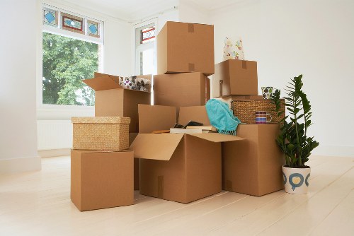 Packed office boxes and labelled equipment prepared for relocation in Richmond upon Thames