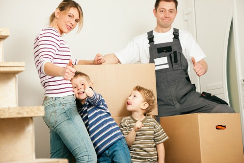Team handling furniture during a house move in Richmond upon Thames