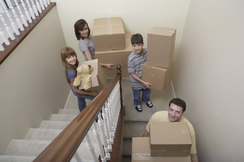 Professional moving team handling furniture in a Richmond area property